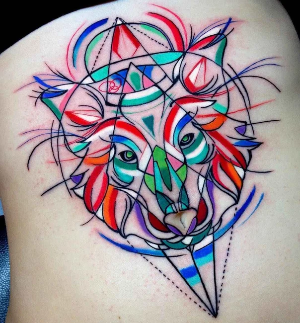 Abstract Wolf tattoo on Shoulder Blade