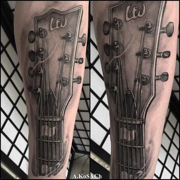 Black & Grey Guitar tattoo on Forearm