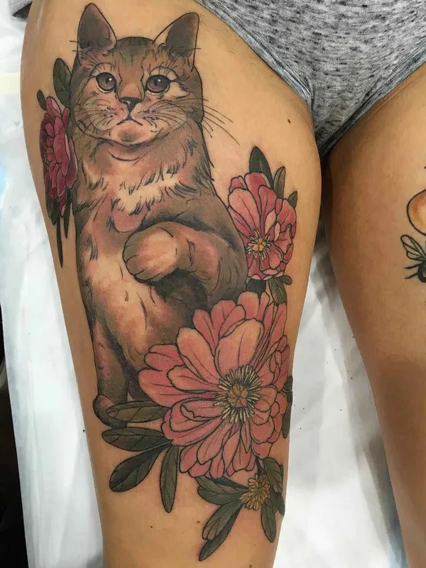 female color realism 纹身 在 thigh #3849 | 纹身师 Sophia Baughan
