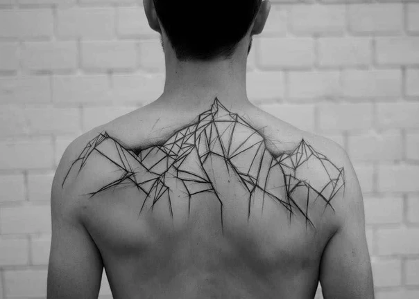 Geometric Mountains tattoo on Upper Back
