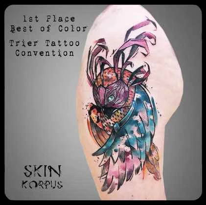Watercolor Owl tattoo on Upper Arm
