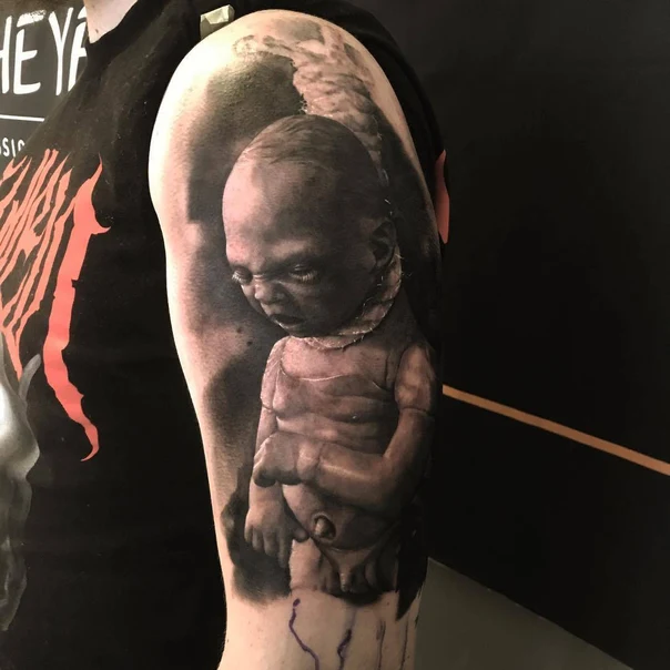 Realism Baby, Portrait tattoo on Upper Arm