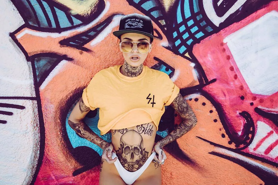Tattooed adult film actress Leigh Raven