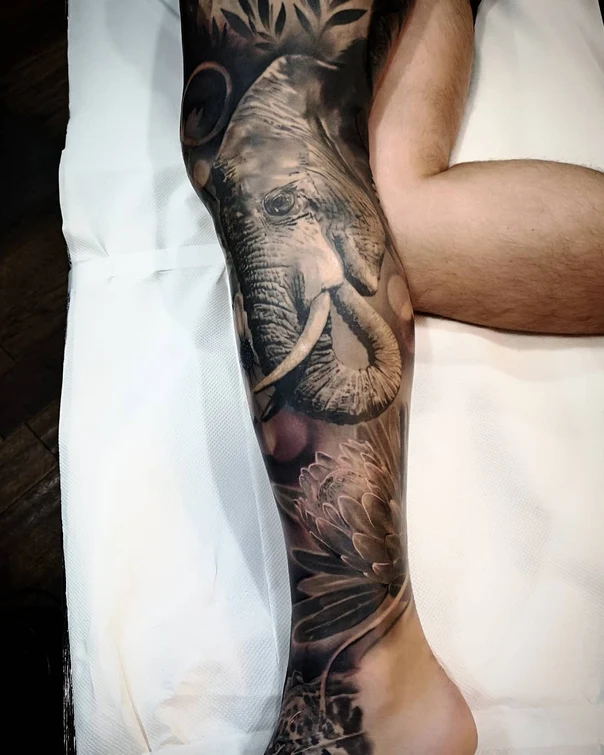 Realism Elephant, Flower tattoo on Calf