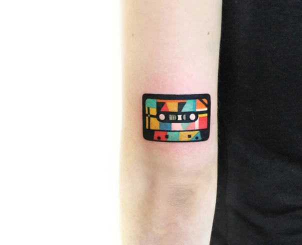 Geometric Cassette tape tattoo on Forearm
