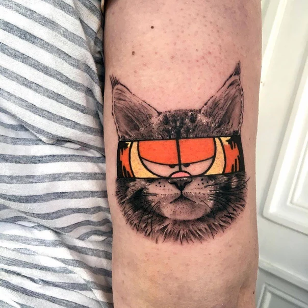 Cartoon Cat, Garfield tattoo on Forearm