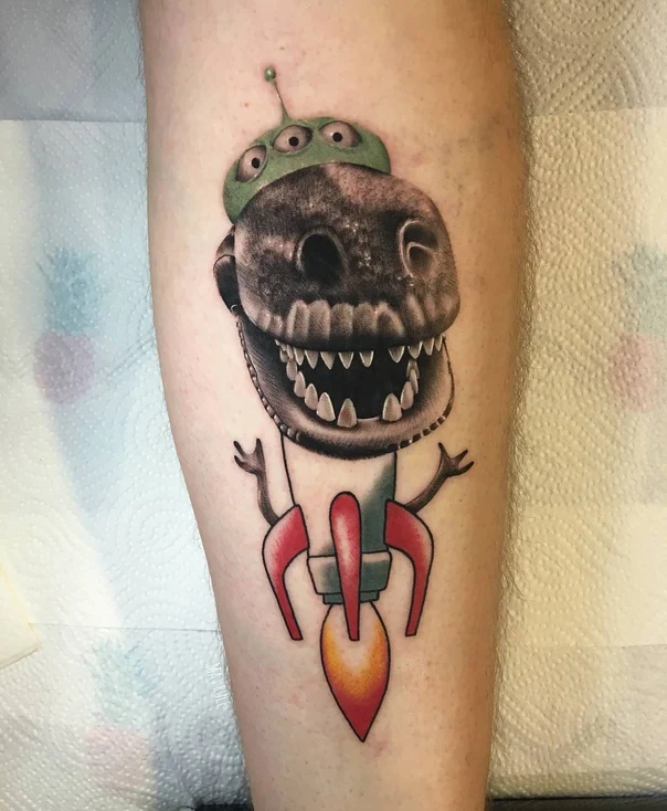 Black & Grey Dinosaur, Alien tattoo on Calf