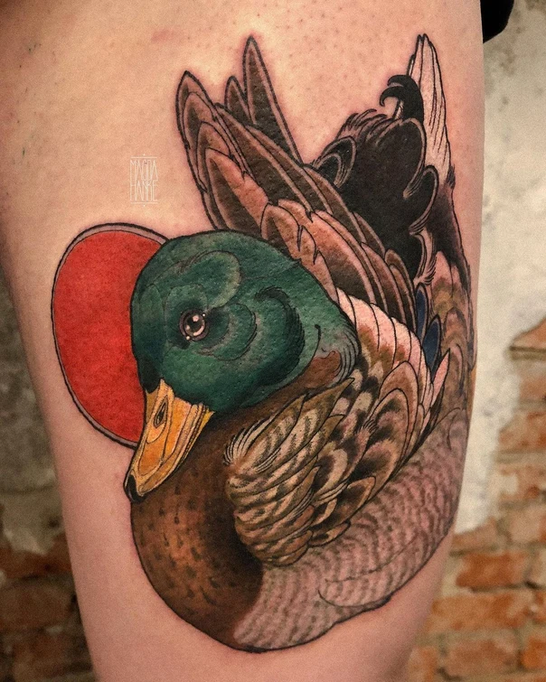 Illustrative Duck, Sun tattoo on Thigh