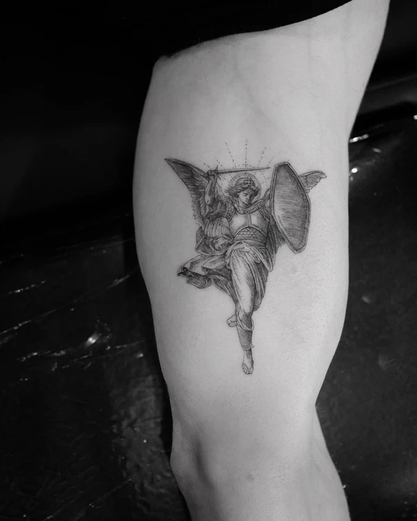 Engraving Angel tattoo on Thigh