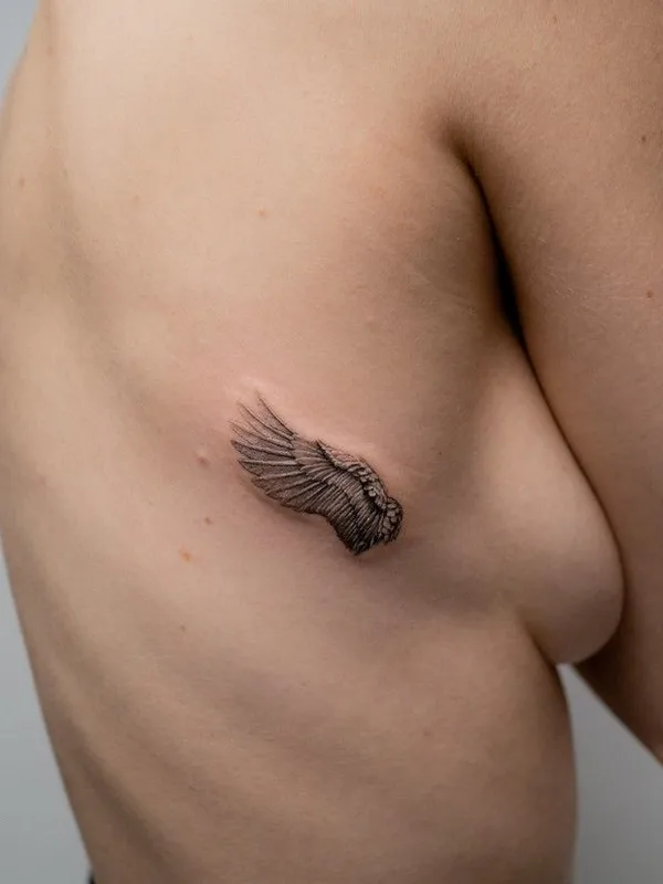 female black and grey blackwork Tatuaggio su ribcage #43180 | Tatuatore Evan Kim