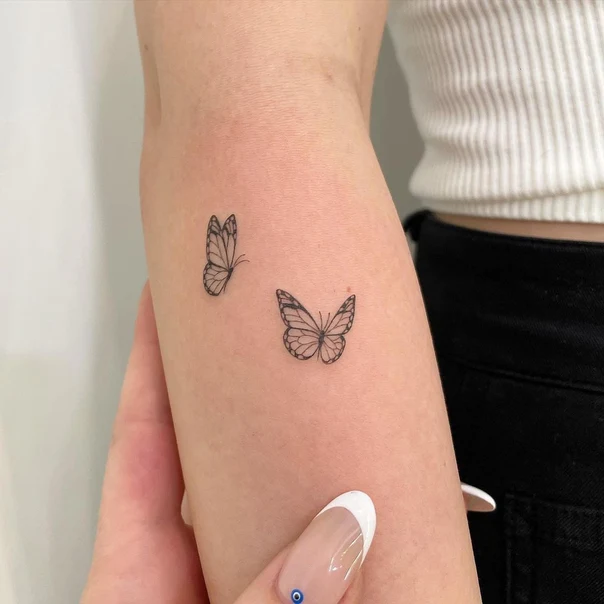 Fineline Butterfly tattoo on Forearm