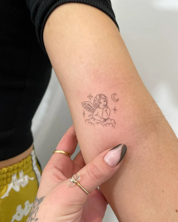 Fineline Angel, Clouds tattoo on Forearm