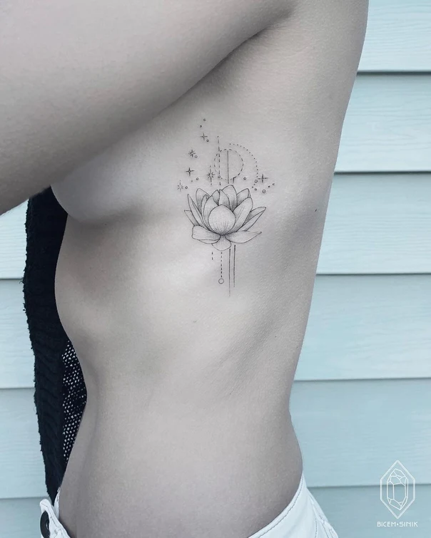 Fineline Lotus, Stars tattoo on Ribcage