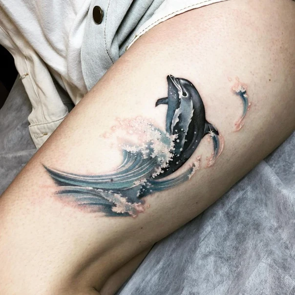 Realism Dolphin, Wave tattoo on Thigh