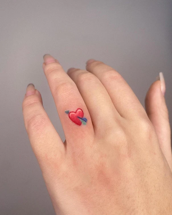 Illustrative Heart, Arrow tattoo on Finger