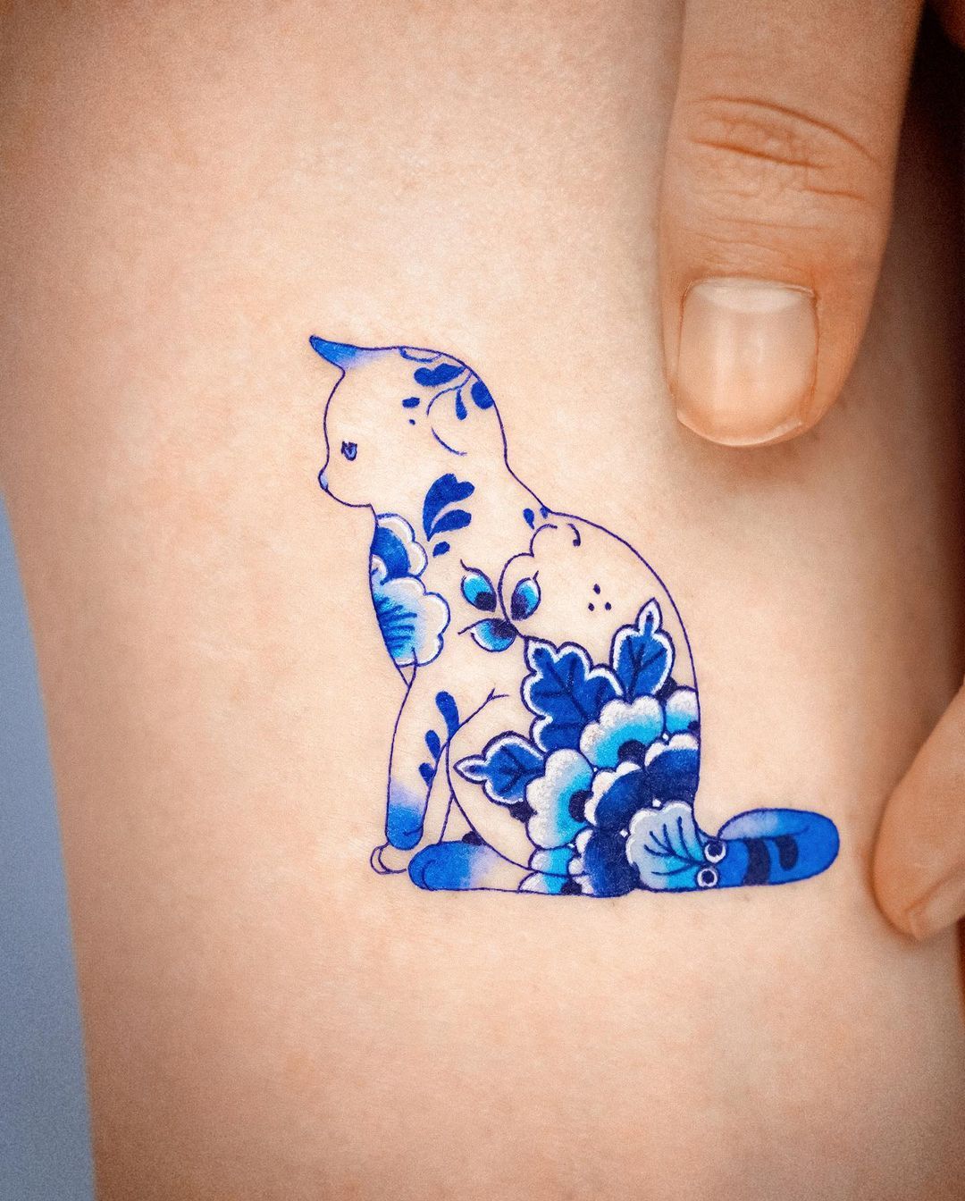 My first  Most sentimental tattoo  blue ink by South Korean artist enal   rCelleTattooSubmission