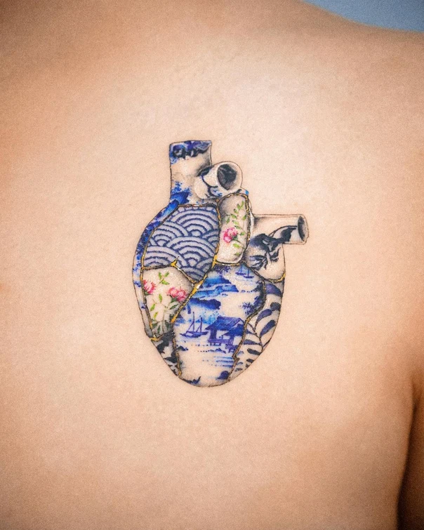 Illustrative Heart, Floral tattoo on Upper Back