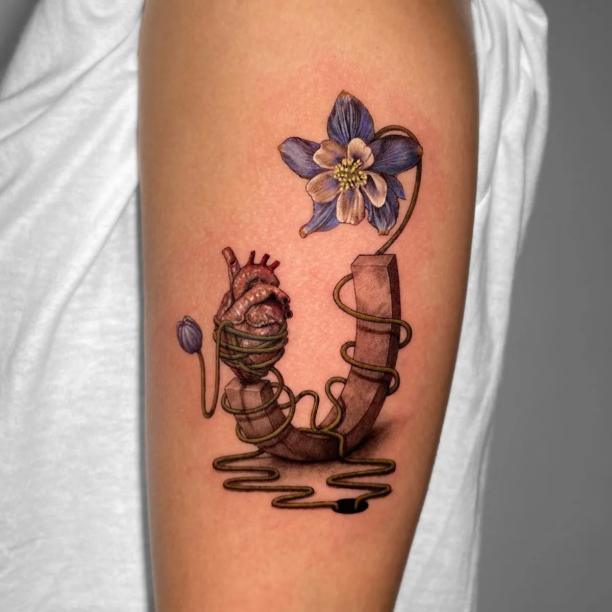Tattoo artist Poesis