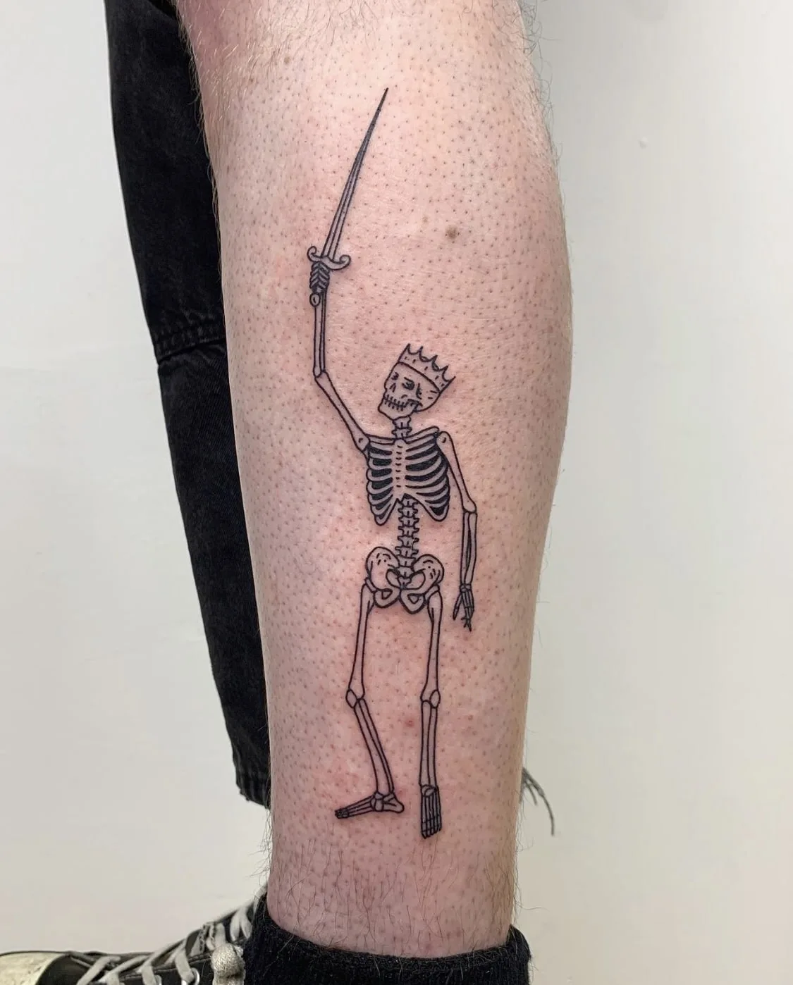 Esqueleto em estilo gravural de tatuagem