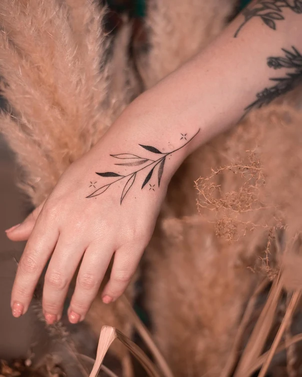 Minimalist Leaves, Star-like dots tattoo on Wrist