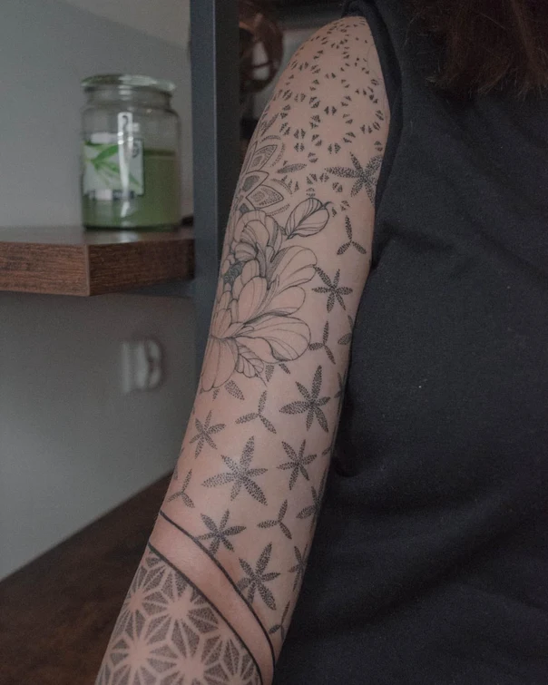 Dotwork Flower, Star-shaped patterns tattoo on Upper Arm