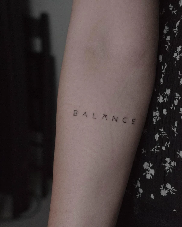 Lettering Text tattoo on Upper Arm