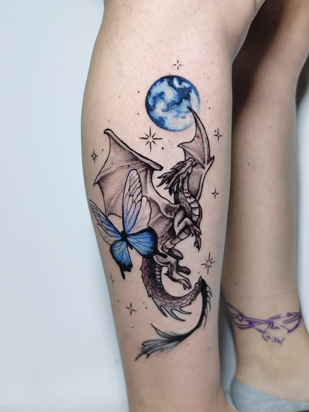 Illustrative Dragon, Butterfly tattoo on Thigh