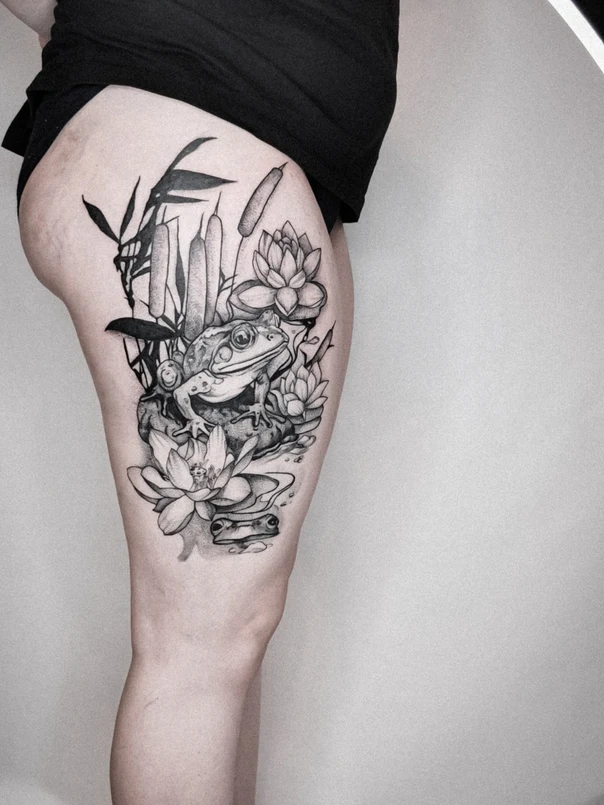 Black & Grey Frog, Lotus tattoo on Thigh