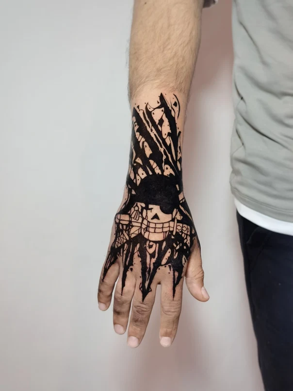 Blackwork Skull tattoo on Hand