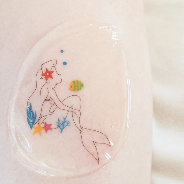 Cartoon Mermaid, Fish tattoo on Thigh