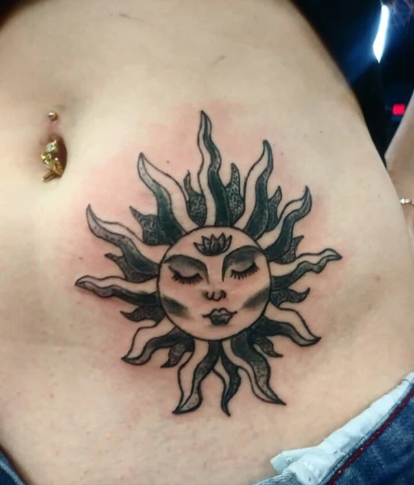 Traditional Sun with face, Rays tattoo on Stomach