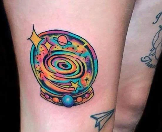 Ornamental Crystal ball, Stars tattoo on Thigh