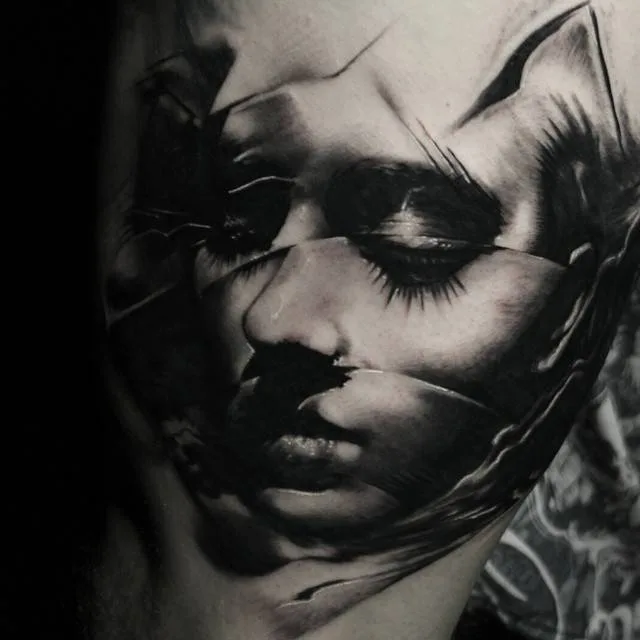 Tattoo artist Kurt Staudinger black and gray realism dark tattoo