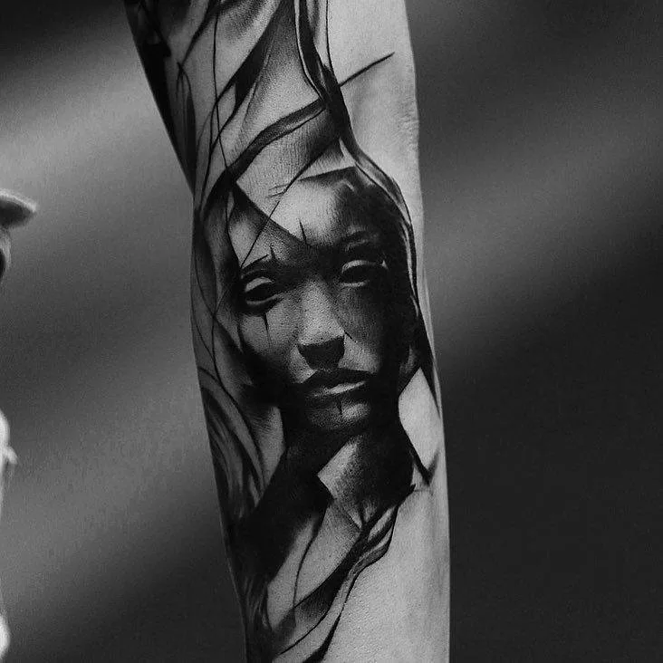 Tattoo artist Kurt Staudinger black and gray realism dark tattoo