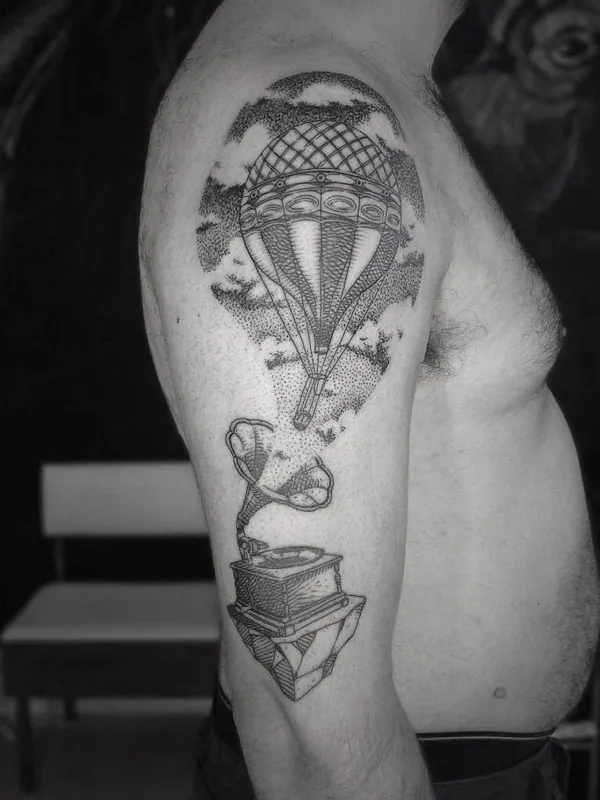 male black and grey blackwork tattoo on upper arm #4979 | Tattoo Artist Otto D’Ambra