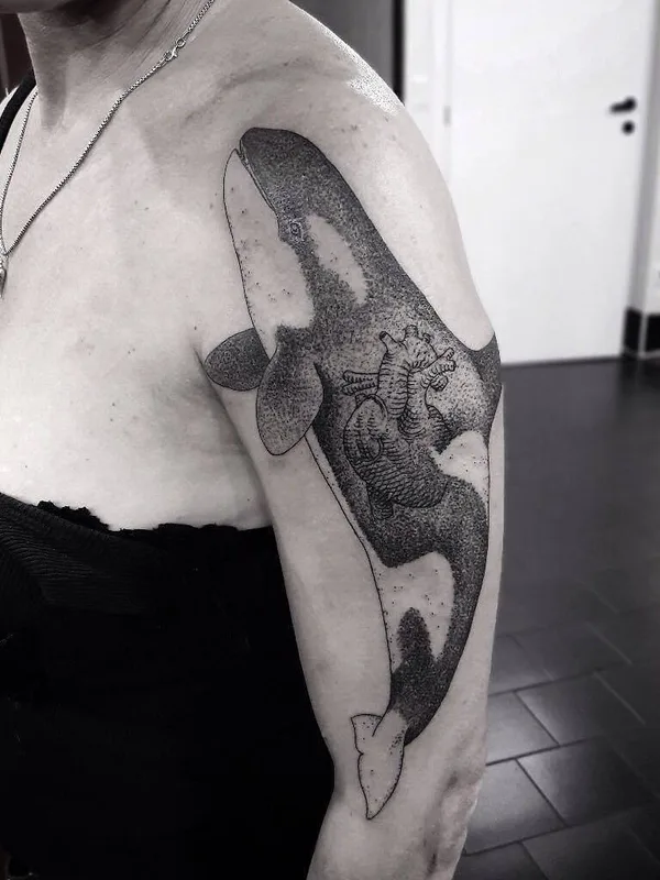 female black and grey blackwork tattoo on upper arm #4968 | Tattoo Artist Otto D’Ambra