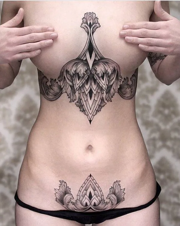 female black and grey ornamental tattoo on chest #4852 | Tattoo Artist Chaim Machlev