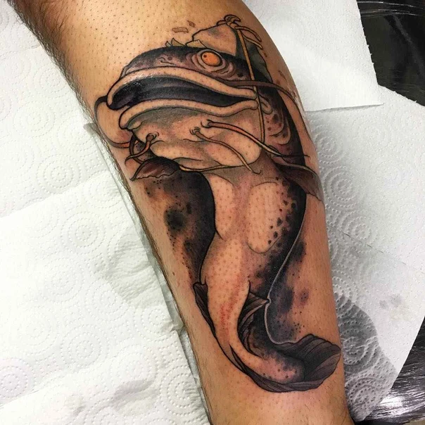 Black & Grey Fish tattoo on Calf