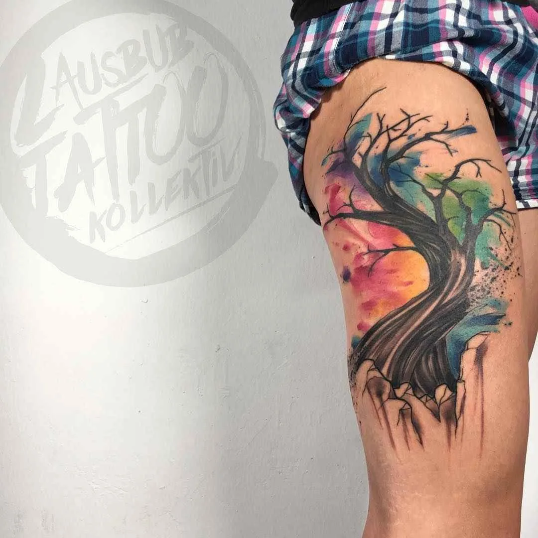 Tattoo artista Emrah De Lausbub crea un tattoo in stile astratto a acquerello | Germania