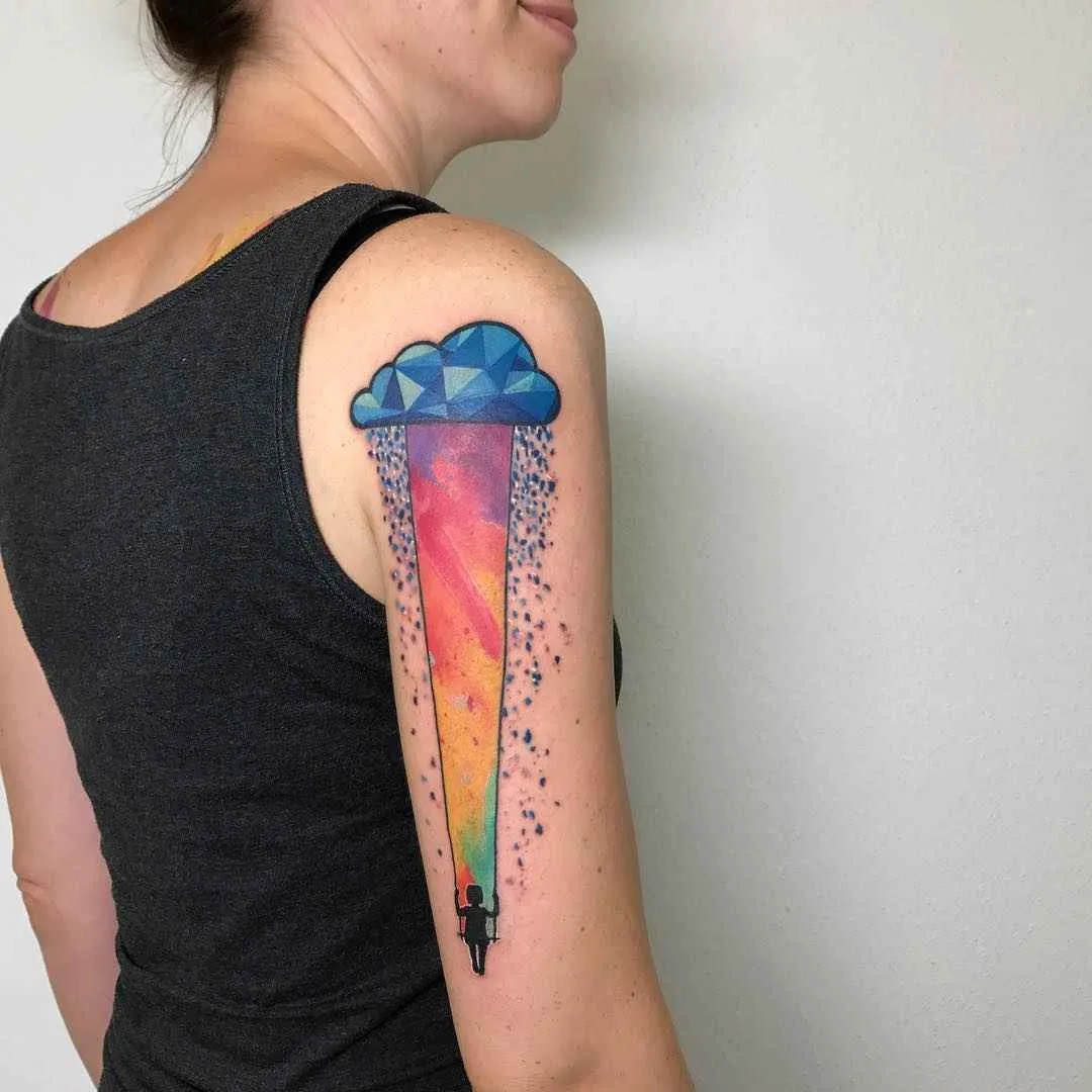 Tattoo artista Emrah De Lausbub crea un tattoo in stile astratto a acquerello | Germania
