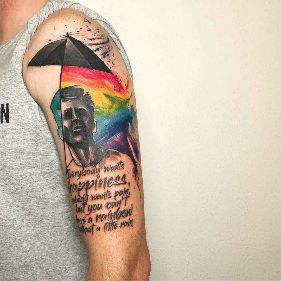 Tattoo artista Emrah De Lausbub crea un tattoo in stile astratto a acquerello | Germania