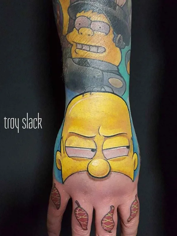 color cartoon tattoo on hand #14405 | Tattoo Artist Troy Slack