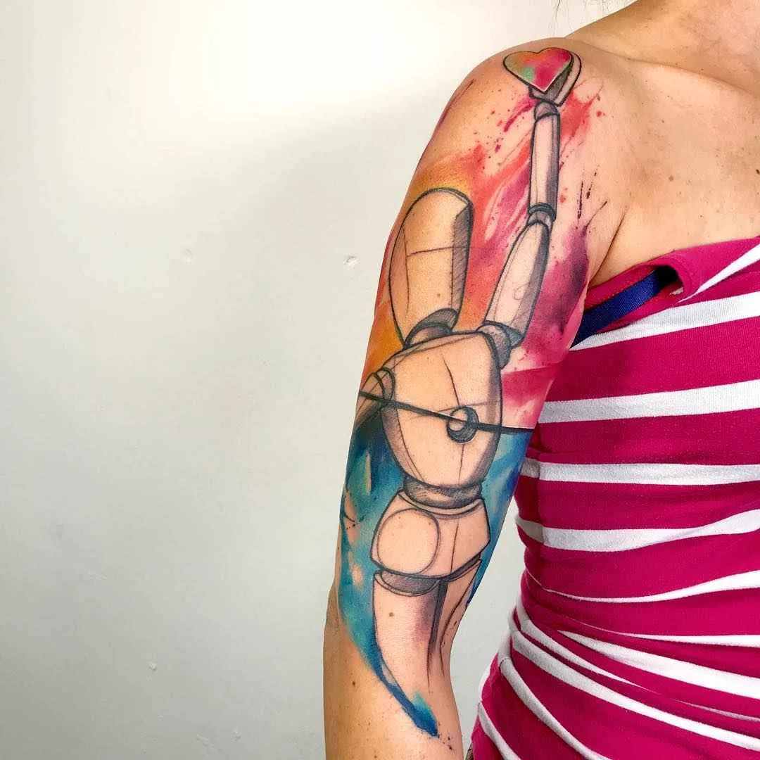 Tattoo artista Emrah De Lausbub crea un tattoo in stile astratto a acquerello | Germania