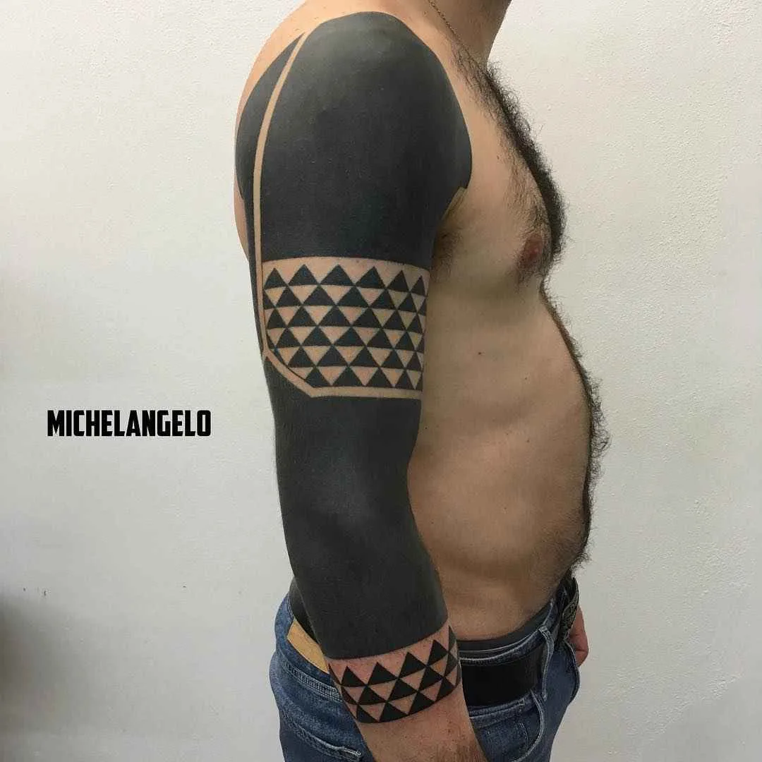 Tattoo artist Michelangelo blackwork tribal tattoo