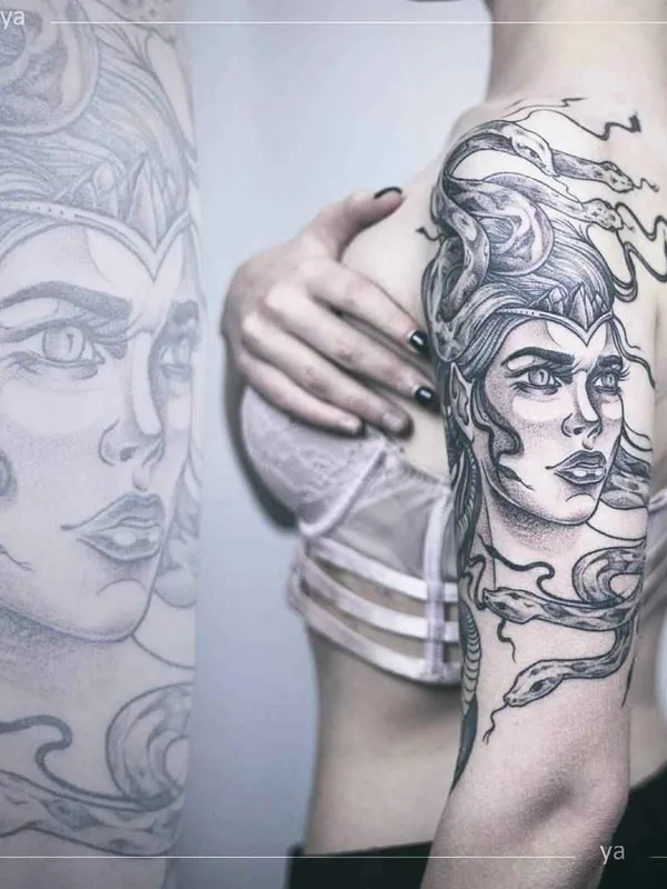 female black and grey black and grey Tatuagem em upper arm #14822 | Tatuador Анастасия Ятссон