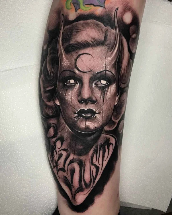 Black & Grey Portrait, Horns tattoo on Calf