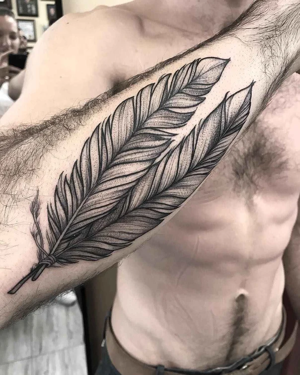 Black & Grey Feather tattoo on Forearm