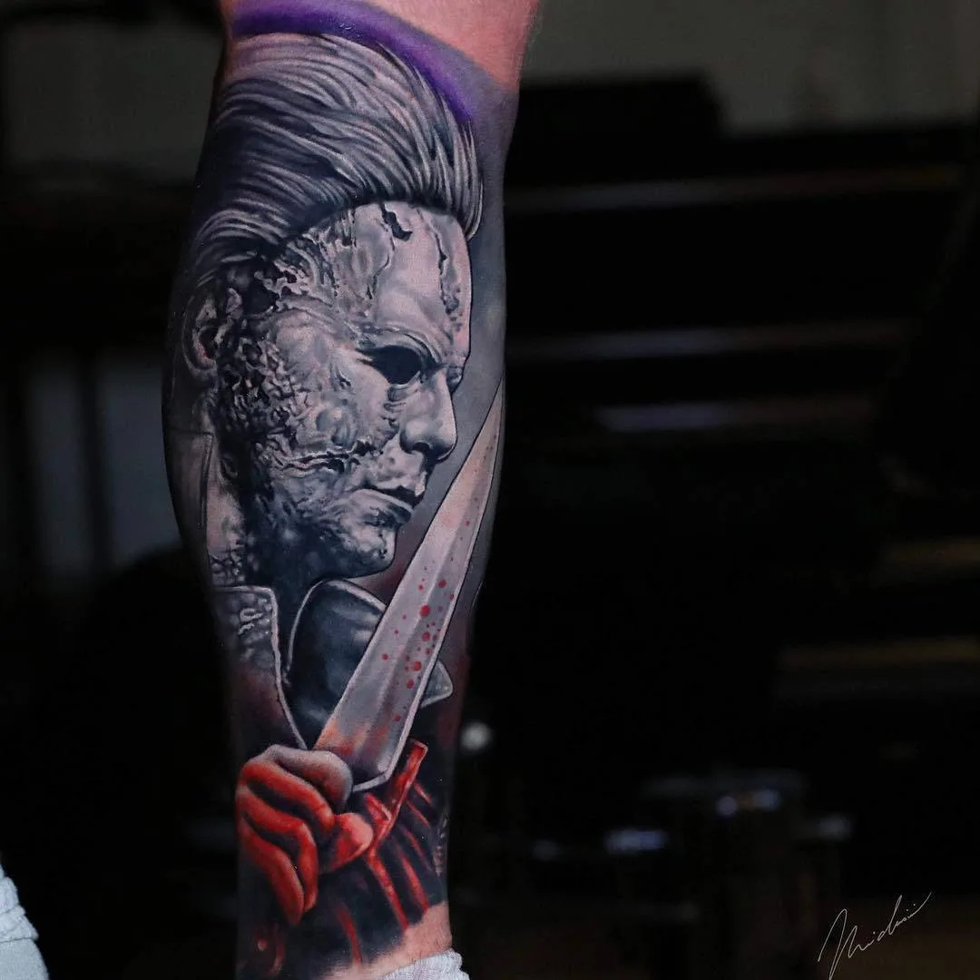 Tattoo artist Michael Cloutier, Michael Myers black and grey with red portrait realistic tattoo | Quebec, Canada