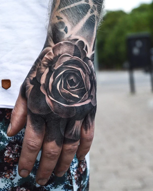 Realism Rose tattoo on Hand