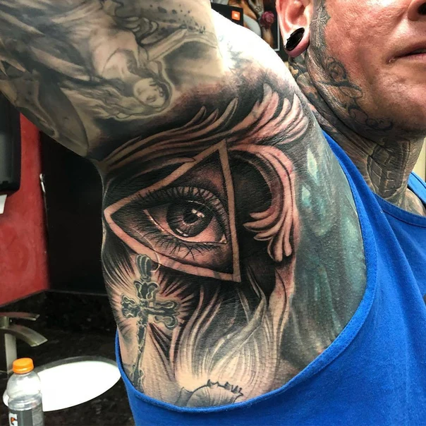 Black & Grey Eye, Cross tattoo on Inner arm